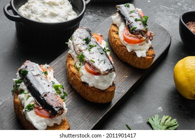 Ricotta Sardine Toast Set, On Black Dark Stone Table Background