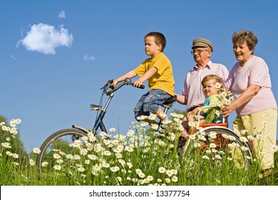Ride with grandparents among daisies