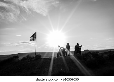 Ride On America. Harley Davidson Motorcycles At Sunset Over The Desert. Black And White