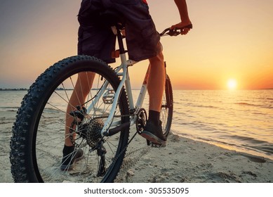 Ride On Bike On The Beach. Sport And Active Life Concept