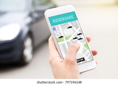 Ride Share Taxi Service On Smartphone Screen. Online Rideshare App And Carpool Mobile Application. Woman Holding Phone With A Car In The Background. Person Ordering Ride With Cellphone.