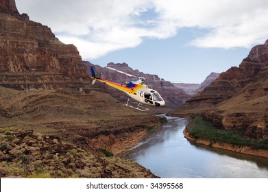 Ride of your life. Chopper flying over Grand Canyon, West Rim. Colorado river, Arizona, USA.