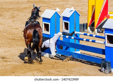 rider has an accident when falling off the horse before attempting to jump an obstacle in an equestrian competition, series of four photos - Powered by Shutterstock