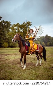 Rider On Horseback. A Man Is Dressed In The Costume Of A 