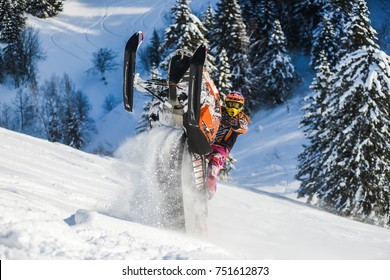 Rider On The Snowmobile In The Mountains Ski Resort In Sakhalin Island Russia.