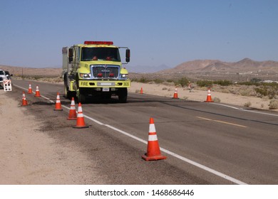 Ridgecrest, CA, USA - July 6th, 2019 : On Highway CA-178, An Emergency Vehicle Is Seen Driving Toward Trona, Following The 7.1 Earthquake That Hit The Day Before.