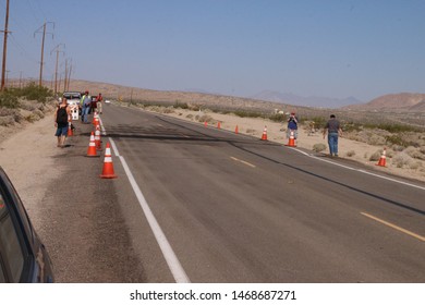 Ridgecrest, CA, USA - July 6th, 2019 : On Highway CA-178, People Are Seen Observing The Damaged Highway.