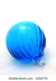 Ridged Clear Blue Blown Glass Ball Ornament.