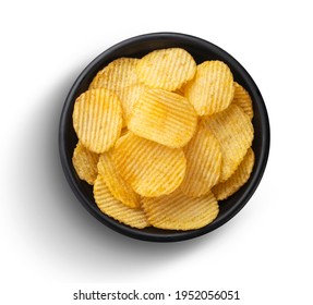 Ridged potato chips in bowl isolated on white background, top view