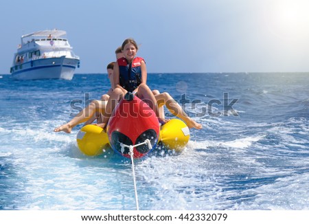 Riding banana boat.