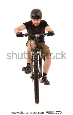 Riding bicyclist isolated on white, studio shot.