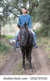  Riding Man Are Training Her Black Horse