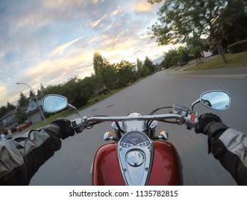 Riding A Motorcycle During A Vibrant Sunset. Taken In Surrey, Greater Vancouver, British Columbia, Canada.