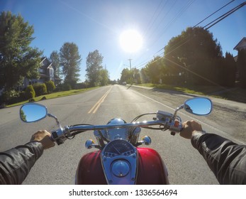 Riding On A Motorcycle In A Residential Neighborhood During A Sunny Summer Day. Taken In Surrey, Vancouver, BC, Canada