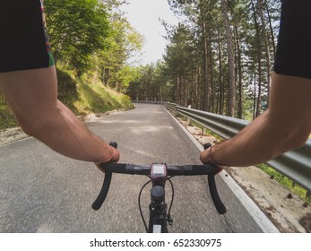 Riding A Racing Bicycle POV. Personal Perspective Of A Young Adult Man Enjoying A Ride On A Racing Bike On A Sunny Spring Morning.