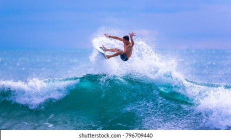 Riding the waves. Costa Rica, surfing paradise. Josue Rodriguez, a talented Costa Rican surfer