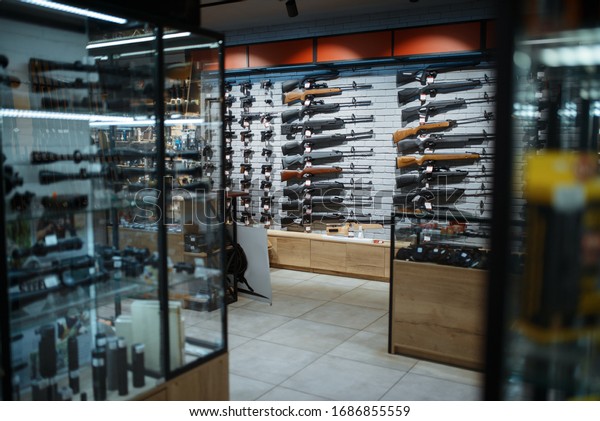 Rifle choice,\
showcase in gun shop,\
nobody