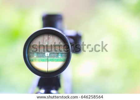 rifle target view. Image of a rifle scope sight used for aiming with a weapon