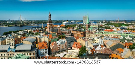 Riga cityscape with old town and river Daugava on sunny summer day