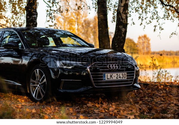 Riga, Latvia 14 November 2018,\
Audi A6 S line C8 Fifth generation 2019 autumn leaves  background\
