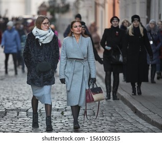 Riga, Latvia - 17.11.2018 Two Young Woman On A Street In Riga.