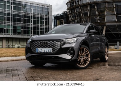 Riga, Latvia 28 February 2022, Audi Q4 e-tron sportback. The Audi Q4 e-tron is a battery electric compact luxury crossover SUV produced by Audi. Stands on parking by modern business centre.  
