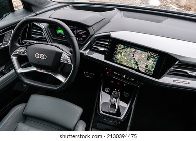Riga, Latvia 28 February 2022 The Audi Q4 e-tron Sportback is a battery electric compact luxury crossover SUV produced by Audi. Interior dashboard close up view to navigation system and steering wheel