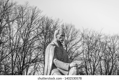 Riga, Latvia, April 2019 - Black and white photo of Janis Rainis statue, Esplanade Park.