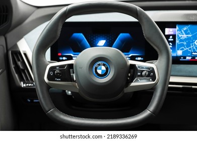 Riga, Latvia - August 11 2022: BMW IX Electric Vehicle Interior Screens In Close Up