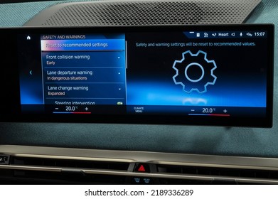 Riga, Latvia - August 11 2022: BMW IX Electric Vehicle Interior Screens In Close Up