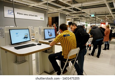 RIGA, Latvia - December 27, 2019: An IKEA Designer Works With Clients, Riga, Latvia. IKEA Is The World's Largest Furniture Retailer And Sells Ready To Assemble Furniture. 