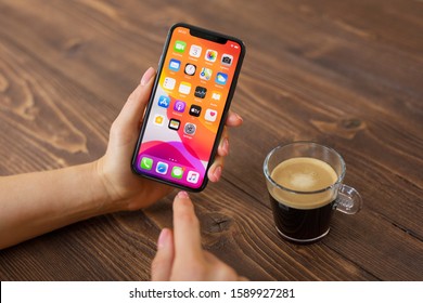 Riga, Latvia - December 3, 2019: Person using Apple iPhone 11 Pro. - Shutterstock ID 1589927281
