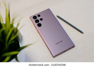 RIGA, LATVIA, FEBRUARY 9 2022 - New Samsung Galaxy S22 Ultra Android smartphone with stylus is displayed for editorial purposes.