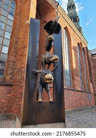 Riga, Latvia - July, 2022: Landmark Statue Of The Bremen Town Musicians Based On Brothers Grimm Fairy Tale In Old Town