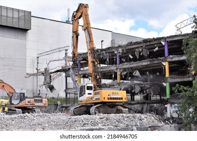Riga, Latvia - July 29, 2022. Demolition of a parking lot building in the center of Riga in order to free space for Rail Baltica railway station