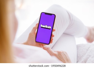 Riga, Latvia - March 26, 2021: Woman Holding Phone With Twitch Logo On The Screen