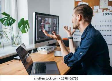 Riga, Latvia - March 28 2020: Portrait Of Caucasian Man Making Facetime Video Calling. Video Call Zoom Meeting. Video Communications Platform For Video And Audio Conferencing And Webinars