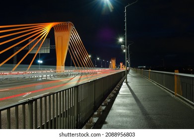 RIGA, LATVIA - NOVEMBER 23, 2021: Riga South Bridge In The Evening