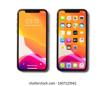 Riga, Latvia - November 28, 2019: Apple IPhone 11 Pro Showing Locked Screen And Home Screen With Default App Icons.