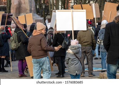 Riga, Latvia - November 30, 2019 : Back View Of Young Mother And Her Child Girl With Placard At Animal Advocacy Event Protest With Signs And Banners In Hands