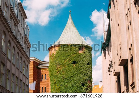 Riga Latvia. View Of Powder Tower On Smilsu Street In Sunny Day Under Summer Blue Sky