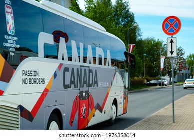 RIGA, LATVIA-MAY 19, 2021: Bus With The Canadian National Ice Hockey Team In Riga