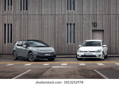 Riga, LV - AUG 13, 2020: New Volkswagen ID. 3 electric car and Volkswagen e-Golf at the parking