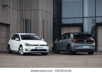 Riga, LV - AUG 13, 2020: New Volkswagen ID. 3 electric car and Volkswagen e-Golf at the parking