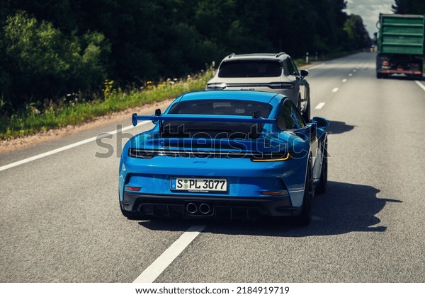 Riga, LV - JUL 18, 2022: Porsche 911 Turbo S\
going fast at the\
autobahn