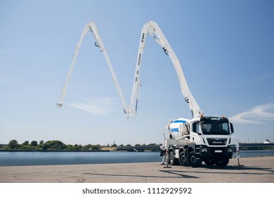 Riga, LV - JUN 01, 2018: Man TGS 35 420 CIFA Truck Mounted Concrete Pump With Decomposed Boom Of Concrete Mixer With Hydraulic Foot Stabilizer Support