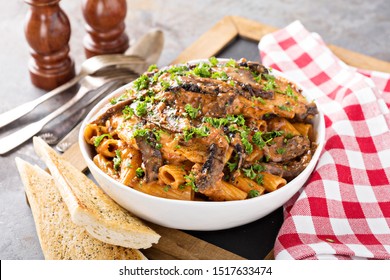 Rigatoni Pasta With Creamy Tomato Sauce A La Vodka And Mushrooms