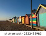 Right before sunset, the colourful beach houses in Brighton Beach in Melbourne, Australia.