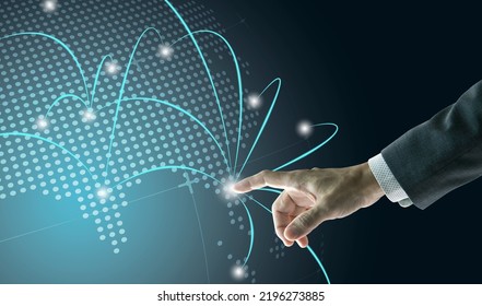 Right hand of a businessman touching digital globe to show business network growth to world wide