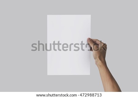 Right hand holding A4 paper in the right hand. Leaflet presentation. Pamphlet hand man. Man show offset paper. Sheet template. Book in hands. Booklet folding design. Fold paper sheet display read.